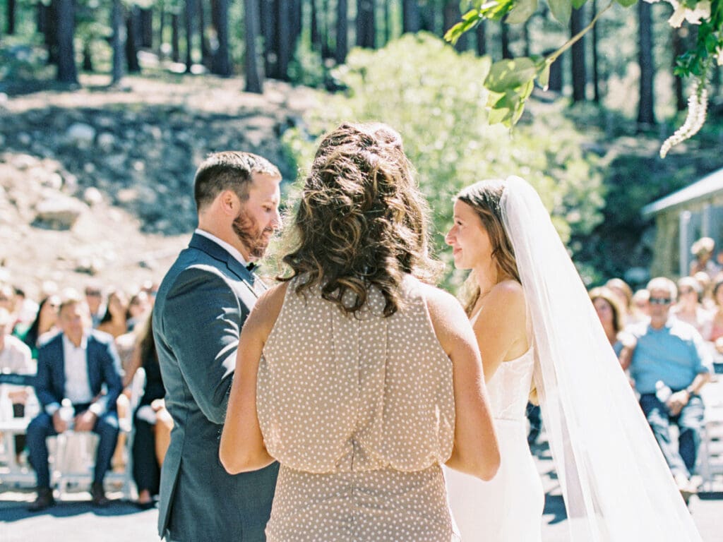 Wedding Ceremony in Galena Creek Hatchery  by Lake Tahoe film wedding photographer 