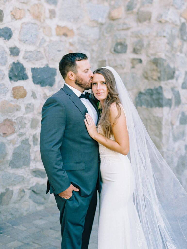 Bride and Groom portraits by film wedding photographer in Lake Tahoe in Galena Creek Hatchery 