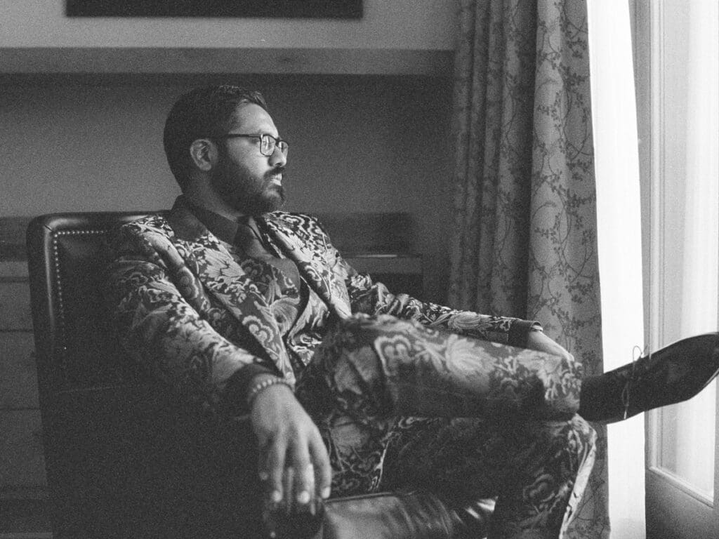 Groom in Gold Dolce & Gabbana Jacquard Sicilia Suit at the Ritz-Carlton's Exquisite Lake Tahoe Wedding 