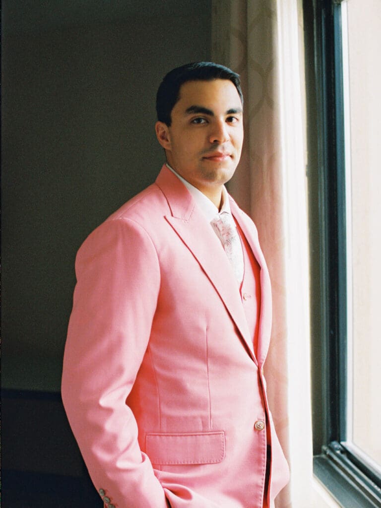 Groom in pink suit at Lake Tahoe Lakeview Lodge Heavenly Mountain Resort wedding | Film photography