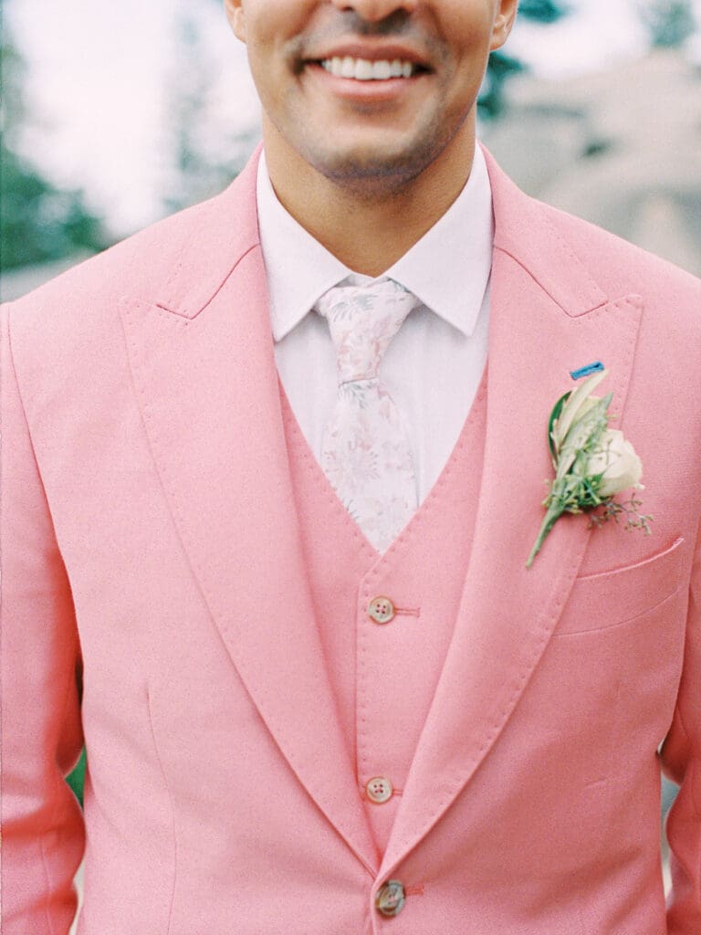 Groom in pink suit at Lake Tahoe Lakeview Lodge Heavenly Mountain Resort wedding | Film photography