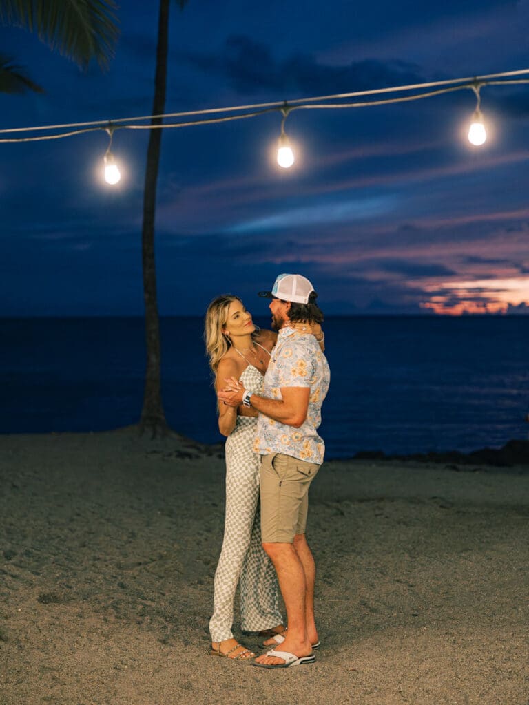 dances after the sunset in Hawaii Big Island Engagement Session 