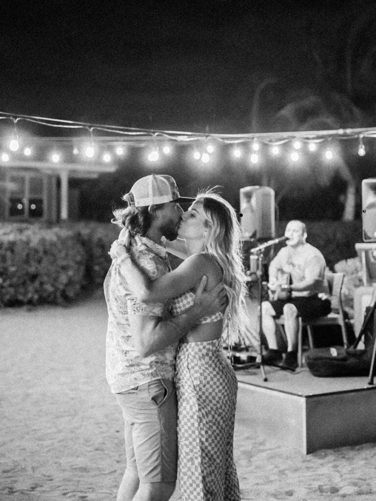 dances after the sunset in Hawaii Big Island Engagement Session. Hawaii wedding photographer photos.