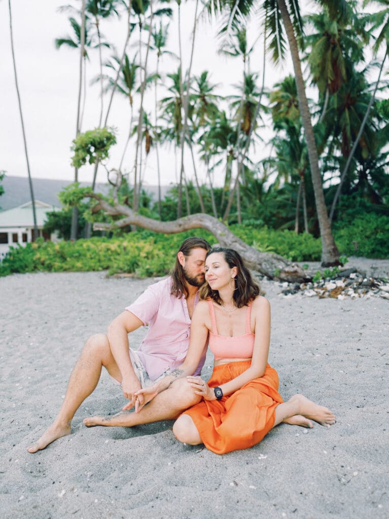 Romantic and intimate Couples Engagement Photo on the tropical Big Island of Hawaii beach by Hawaii film wedding photographer