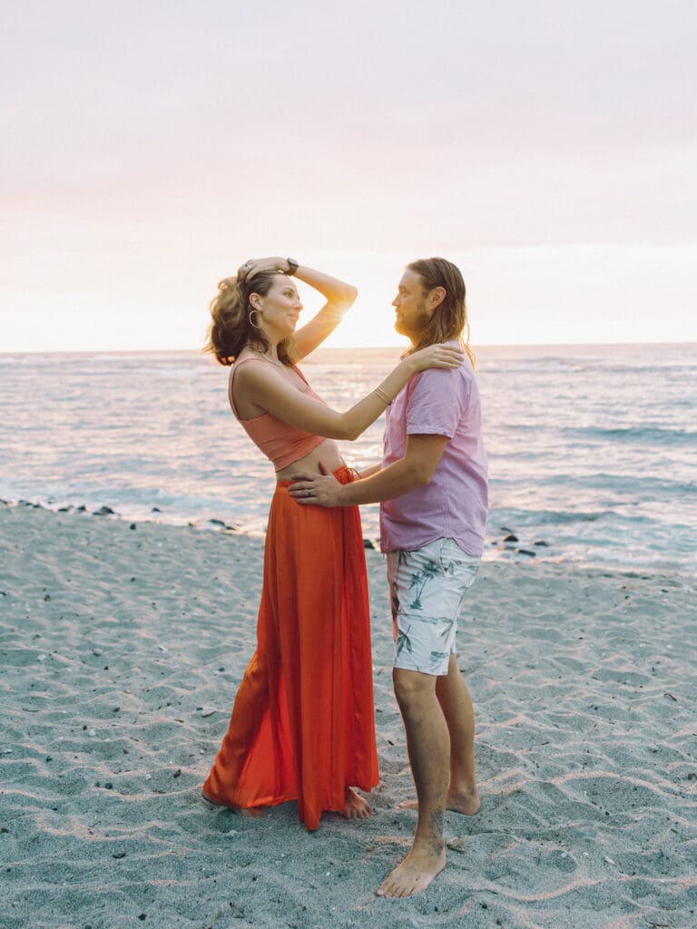 sunset Couples Engagement Photo on the tropical Big Island of Hawaii beach by Hawaii film wedding photographer