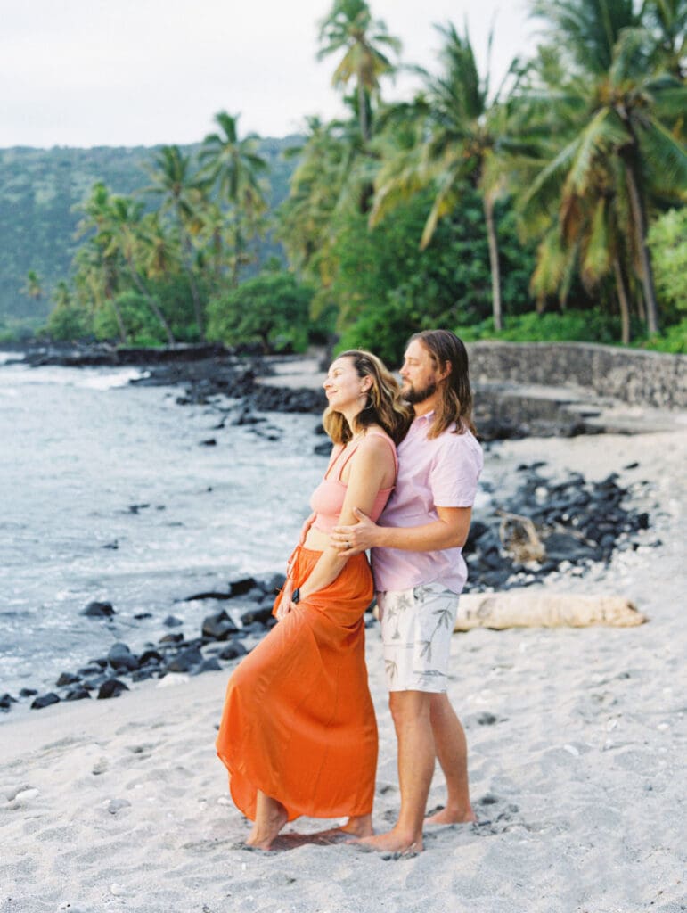 Couples Engagement Photo on the Big Island of Hawaii beach by Hawaii wedding photographer