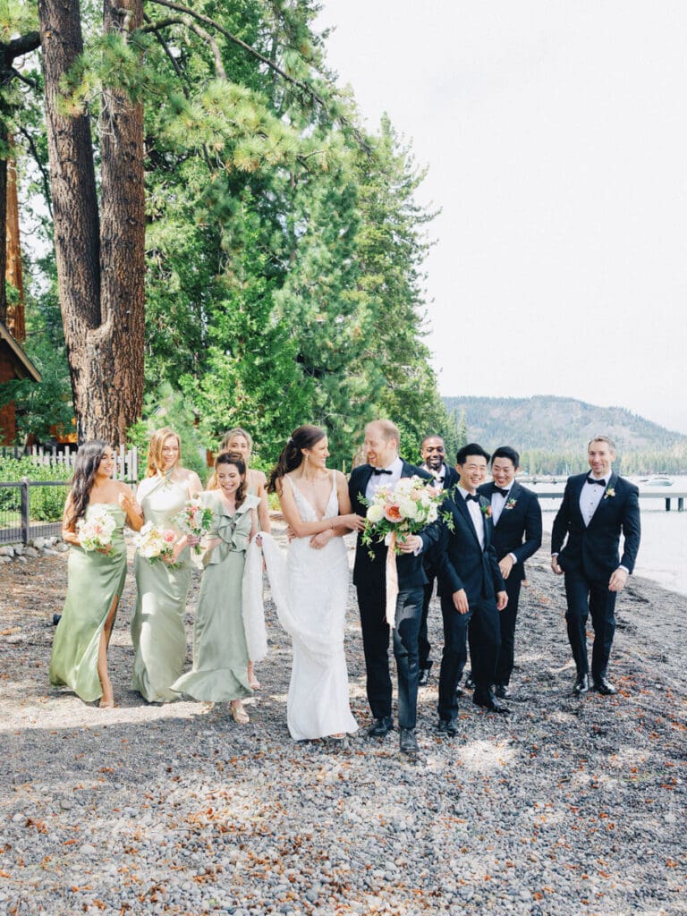 Wedding party on the beach at Edgewood Tahoe Resort wedding, highlighting the stunning backdrop of Lake Tahoe.