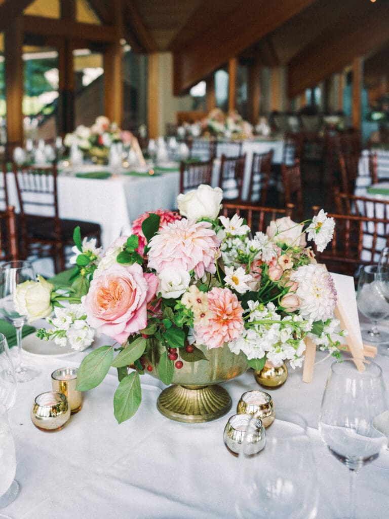 Elegant table setting featuring blush flowers showcasing wedding decor at Edgewood Tahoe Resort.