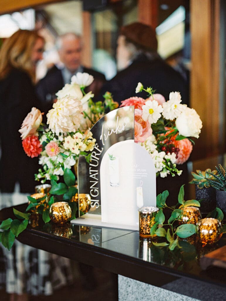 Elegant table setting featuring blush flowers showcasing wedding decor at Edgewood Tahoe Resort.