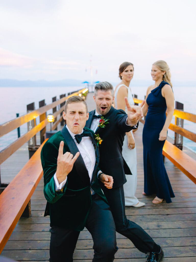 Guests pose for a photo during cocktail hour at Gar Woods Lake Tahoe Wedding