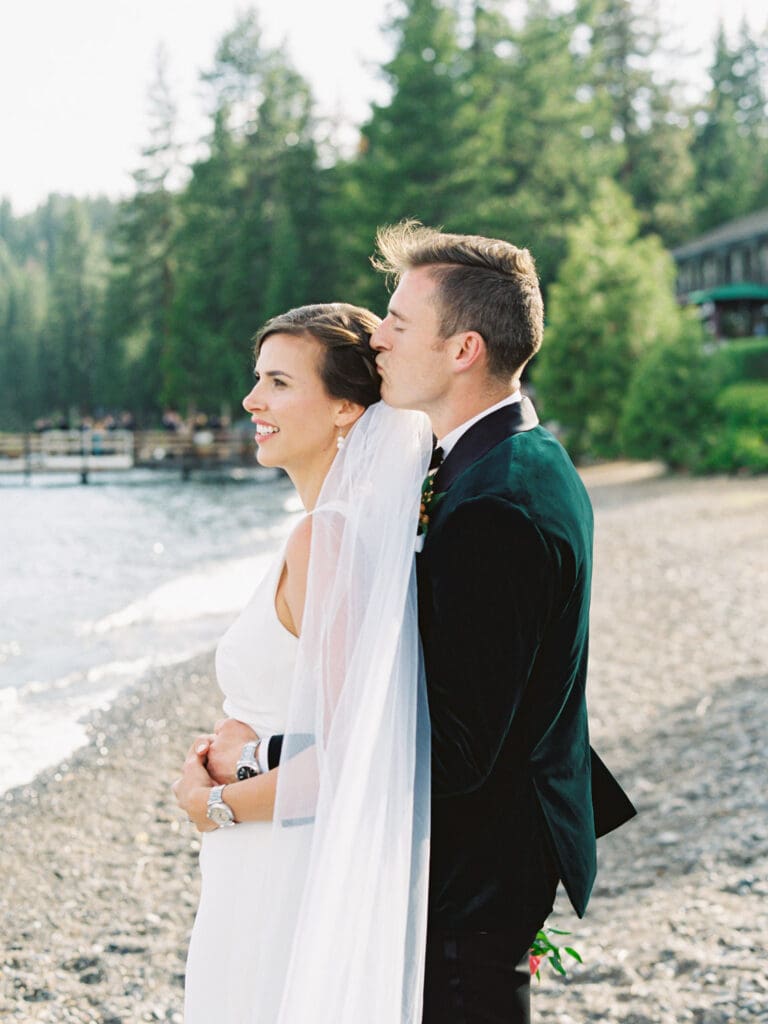 The bride and groom pose together at Gar Woods, Lake Tahoe golden hour portraits showcasing their love on their wedding day.