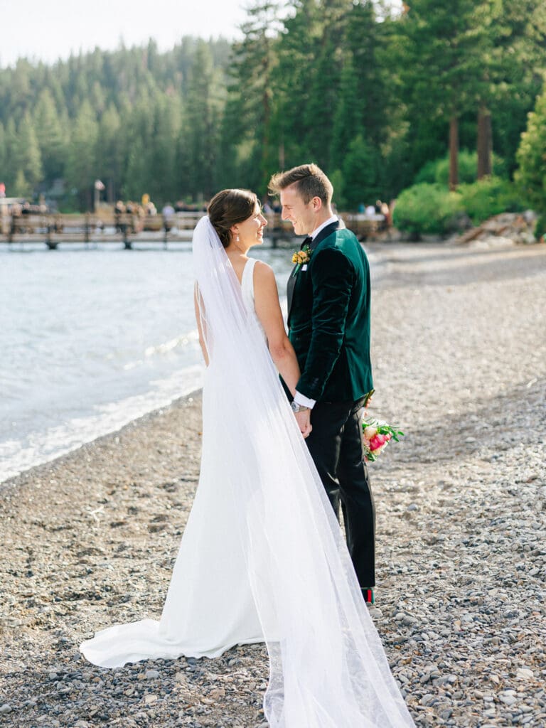 The bride and groom pose together at Gar Woods, Lake Tahoe golden hour portraits showcasing their love on their wedding day.