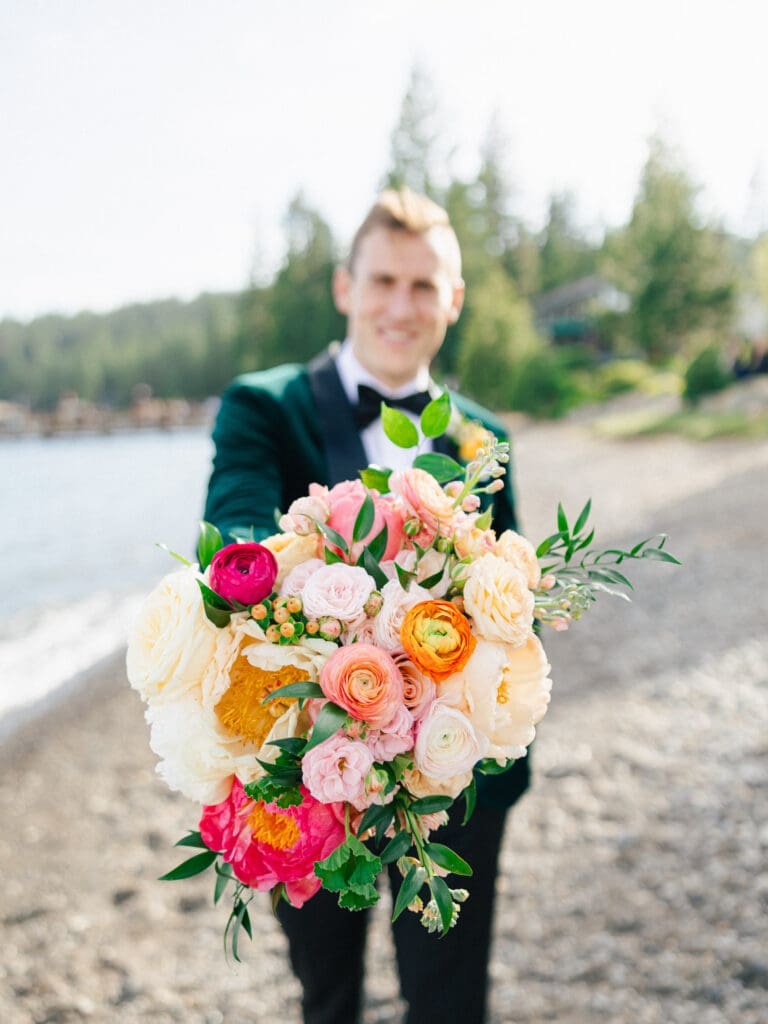 groom pose together at Gar Woods, Lake Tahoe golden hour portraits showcasing their love on their wedding day.