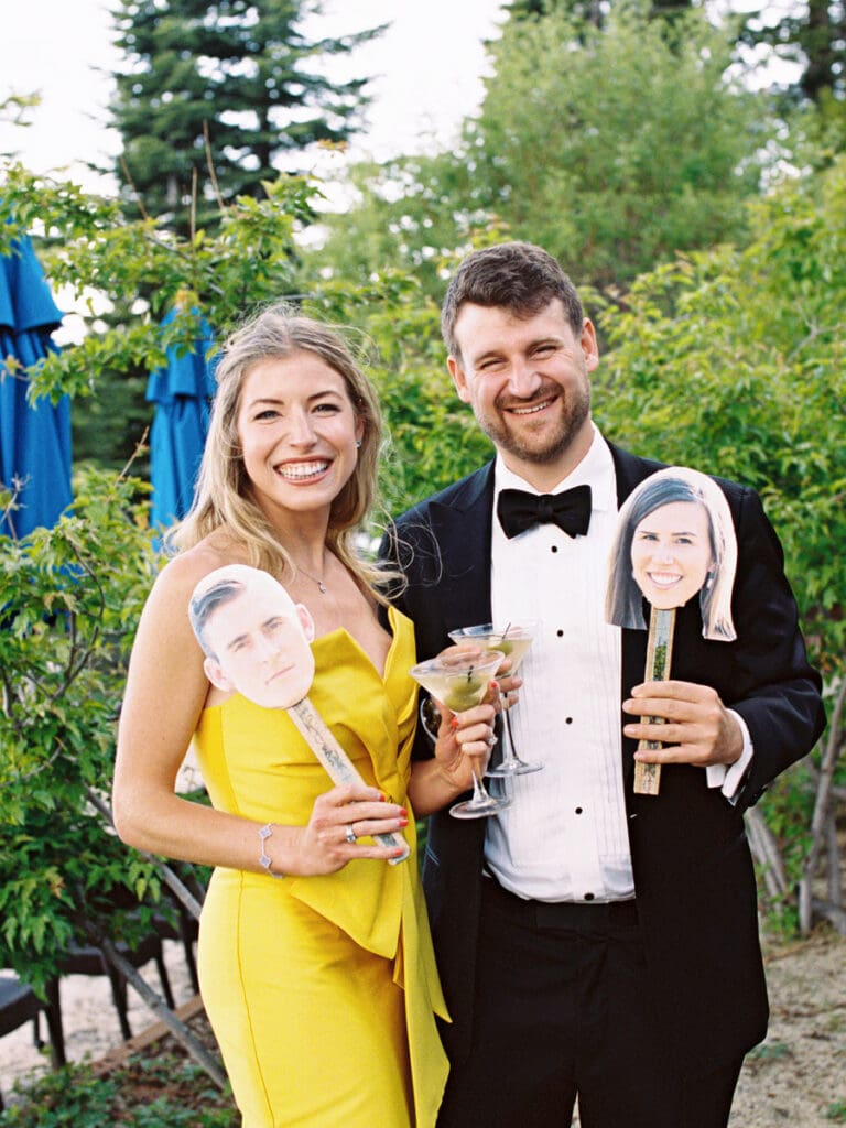 Guests pose for a photo during cocktail hour at Gar Woods Lake Tahoe Wedding