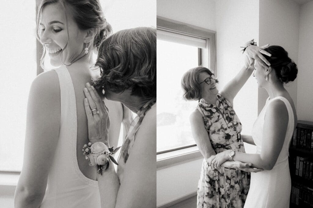 A touching scene of a mother and daughter sharing a moment and standing by a window whilst getting ready for Gar Woods Lake Tahoe wedding.