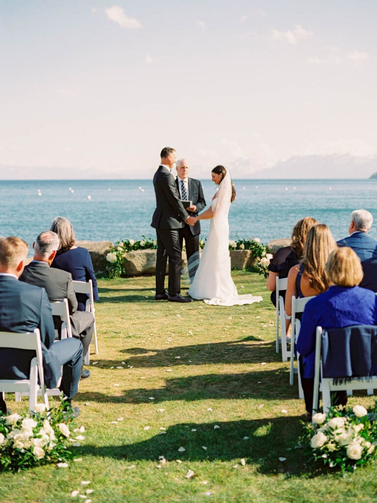 A picturesque wedding ceremony at Gar Woods, Lake Tahoe each, captured by a professional Lake Tahoe wedding photographer, showcasing love and nature.