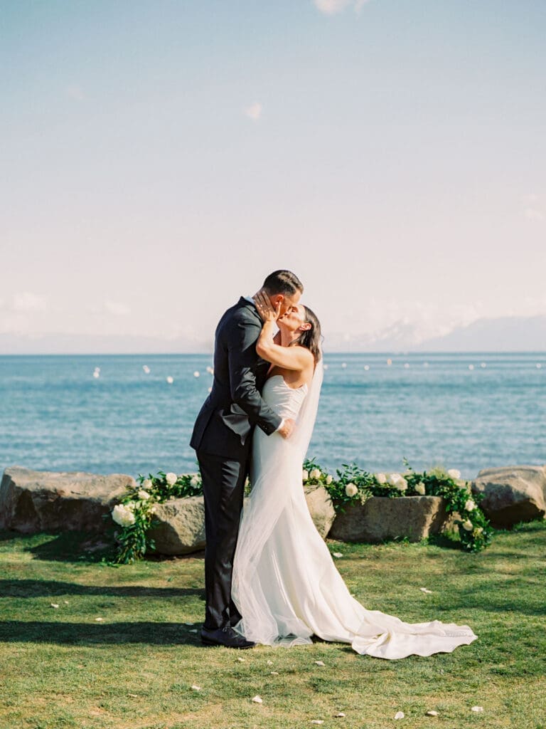 A picturesque wedding ceremony at Gar Woods, Lake Tahoe each, captured by a professional Lake Tahoe wedding photographer, showcasing love and nature.