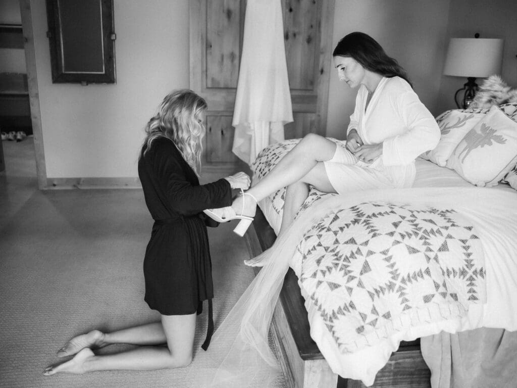 A joyful bride in her wedding attire, getting ready, filled with excitement and elegance. 