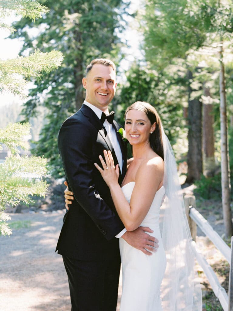 A wedding photographer captures stunning bride and groom portraits at Gar Woods, Lake Tahoe, showcasing love and elegance.