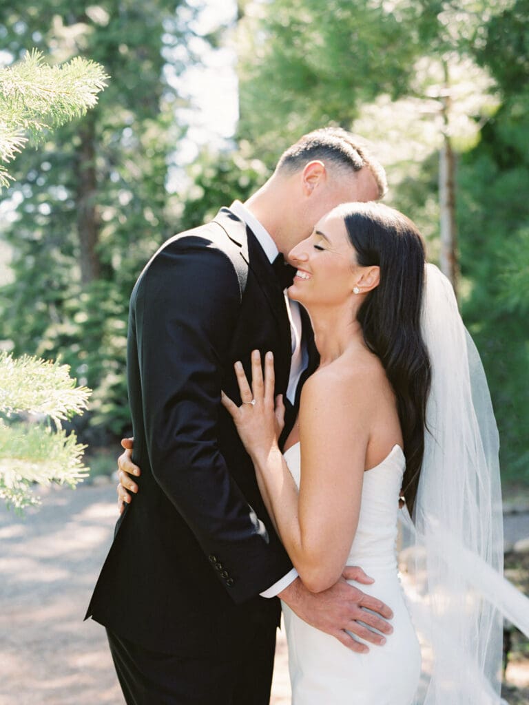 A wedding photographer captures stunning bride and groom portraits at Gar Woods, Lake Tahoe, showcasing love and elegance.