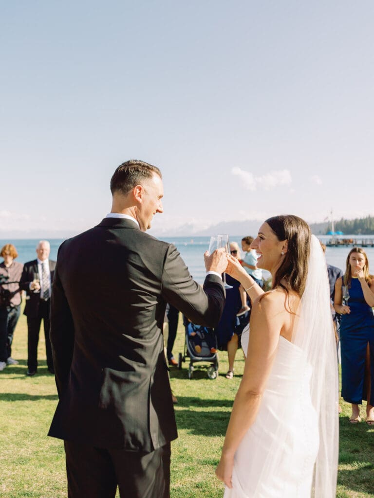 A wedding photographer captures stunning bride and groom portraits at Gar Woods, Lake Tahoe, showcasing love and elegance.