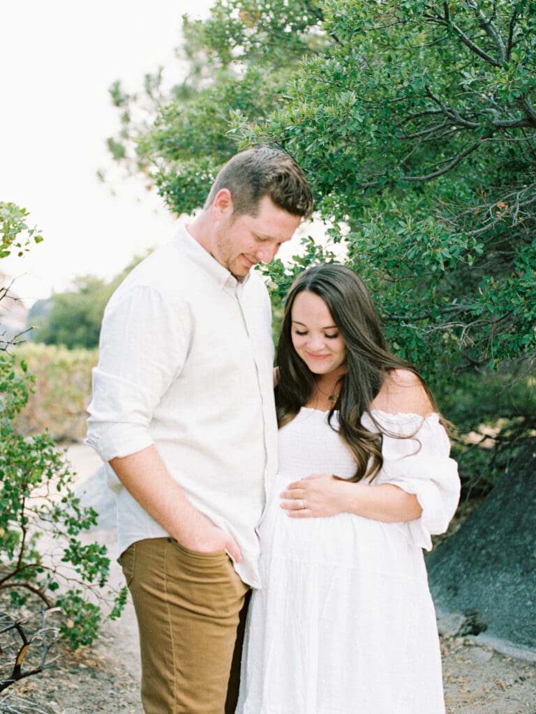 Maternity photography in Lake Tahoe, highlighting the elegance of an expecting mother against a breathtaking lakeside backdrop.