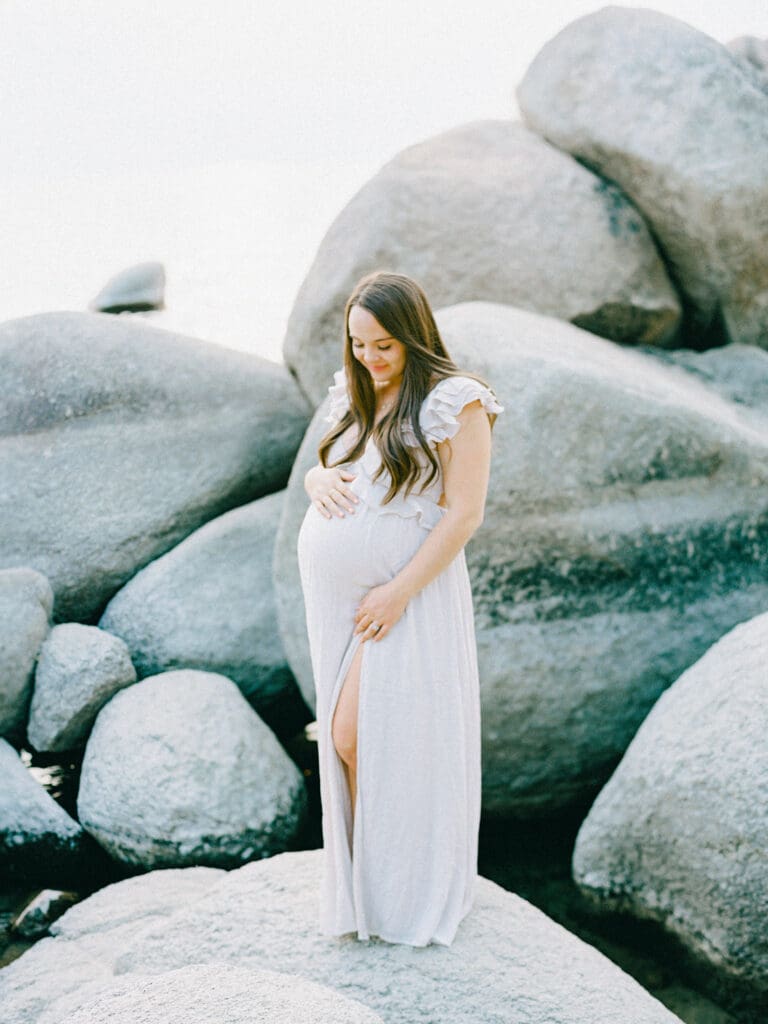 Maternity photography in Lake Tahoe, highlighting the elegance of an expecting mother against a breathtaking lakeside backdrop.