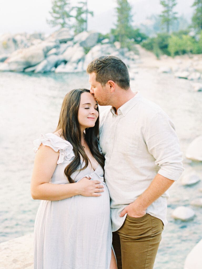 Lake Tahoe Maternity photography, highlighting the elegance of an expectant mother amidst breathtaking Tahoe lake and mountain scenery.