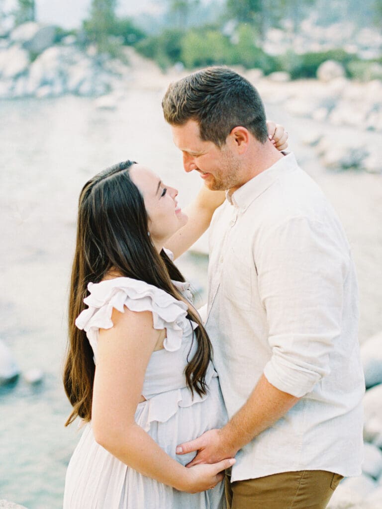 Lake Tahoe Maternity photography, highlighting the elegance of an expectant mother amidst breathtaking Tahoe lake and mountain scenery.