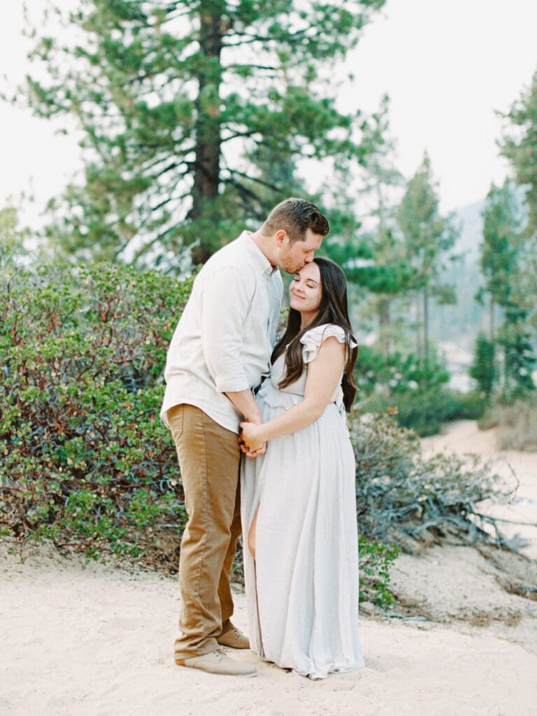 Lake Tahoe Maternity photography, highlighting the elegance of an expectant mother amidst breathtaking Tahoe lake and mountain scenery.