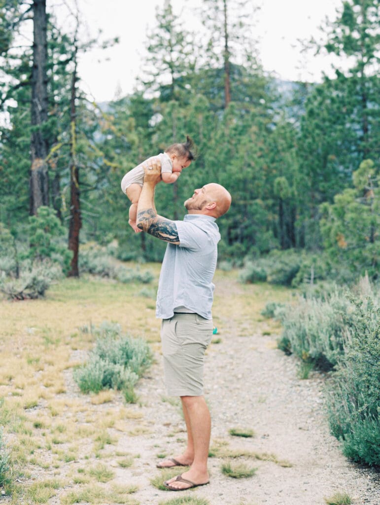 Dad and son family photo in Lake Tahoe  woods by Lake Tahoe film family photographer 