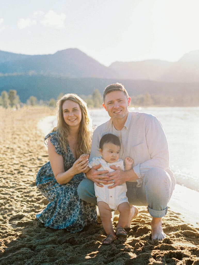 A family enjoys a memorable photo session at Lake Tahoe, surrounded by stunning natural scenery and smiles.