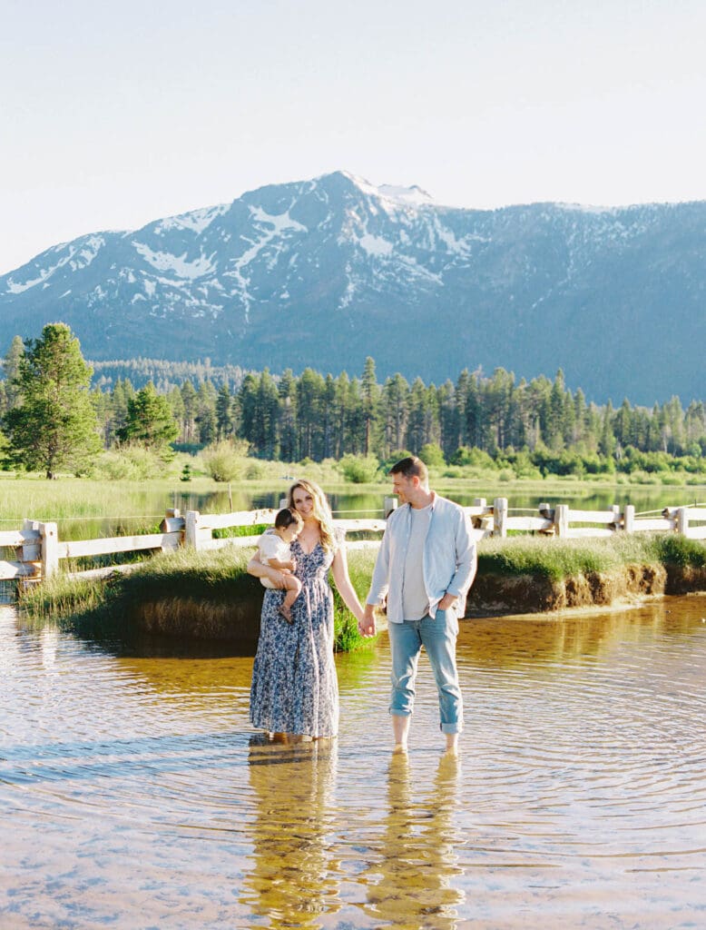 A family enjoys a memorable photo session at Lake Tahoe, surrounded by stunning natural scenery and smiles.