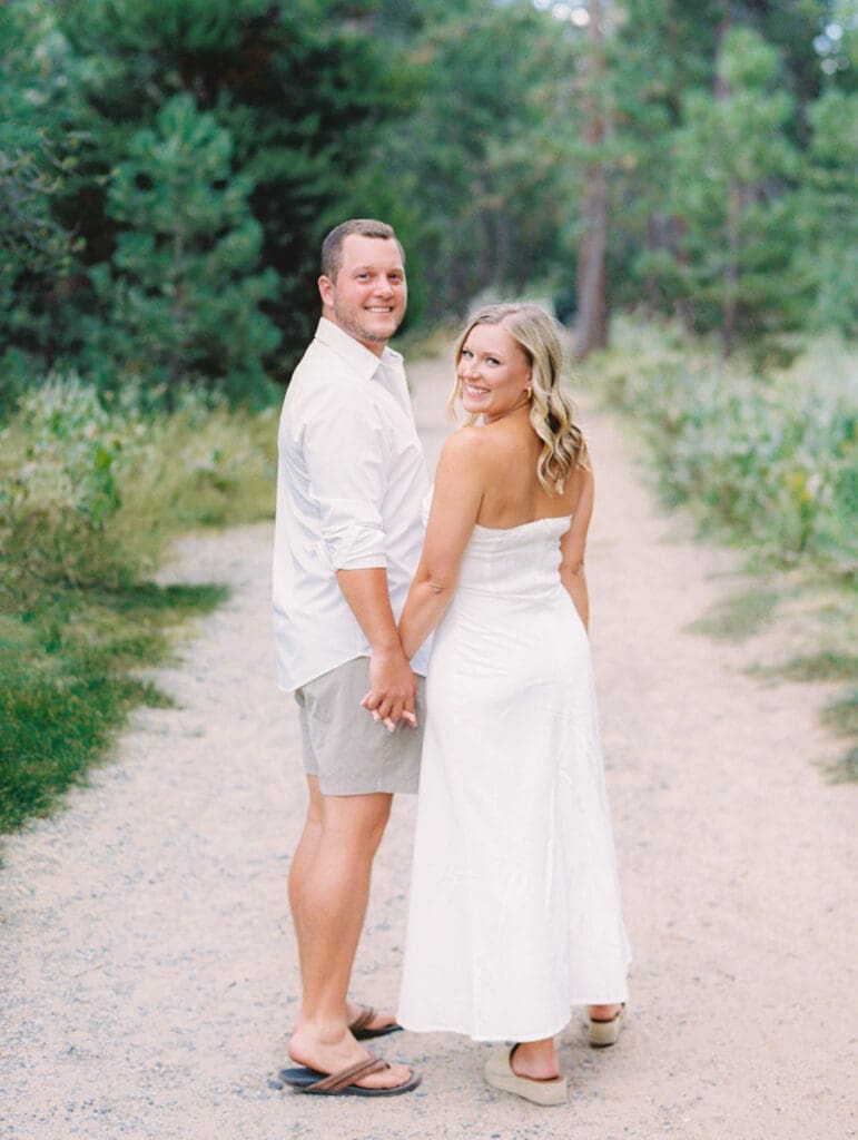 Captivating engagement photos at Lake Tahoe, with a breathtaking sunset and scenic mountain backdrop.