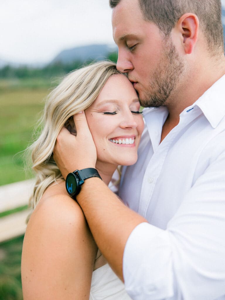 Captivating engagement photos at Lake Tahoe, with a breathtaking sunset and scenic mountain backdrop.