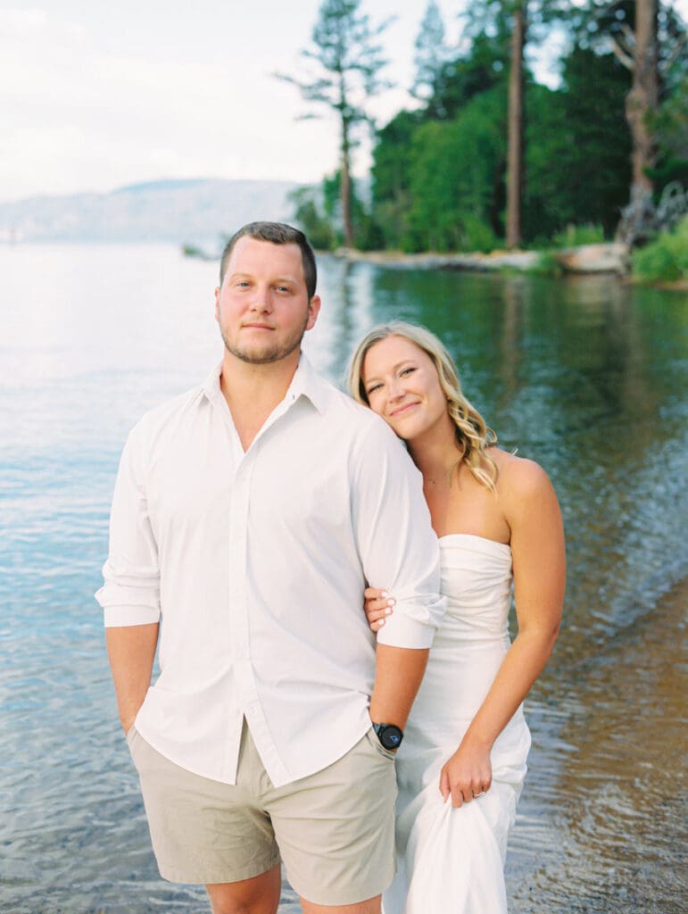 Captivating engagement photos at Lake Tahoe, with a breathtaking sunset and scenic mountain backdrop.