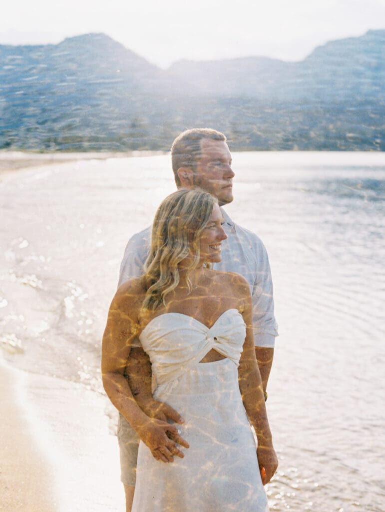 Captivating engagement photos at Lake Tahoe, with a breathtaking sunset and scenic mountain backdrop.