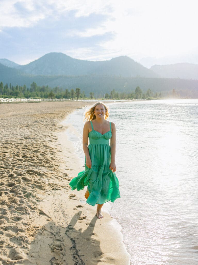 Captivating engagement photos at Lake Tahoe, with a breathtaking sunset and scenic mountain backdrop.