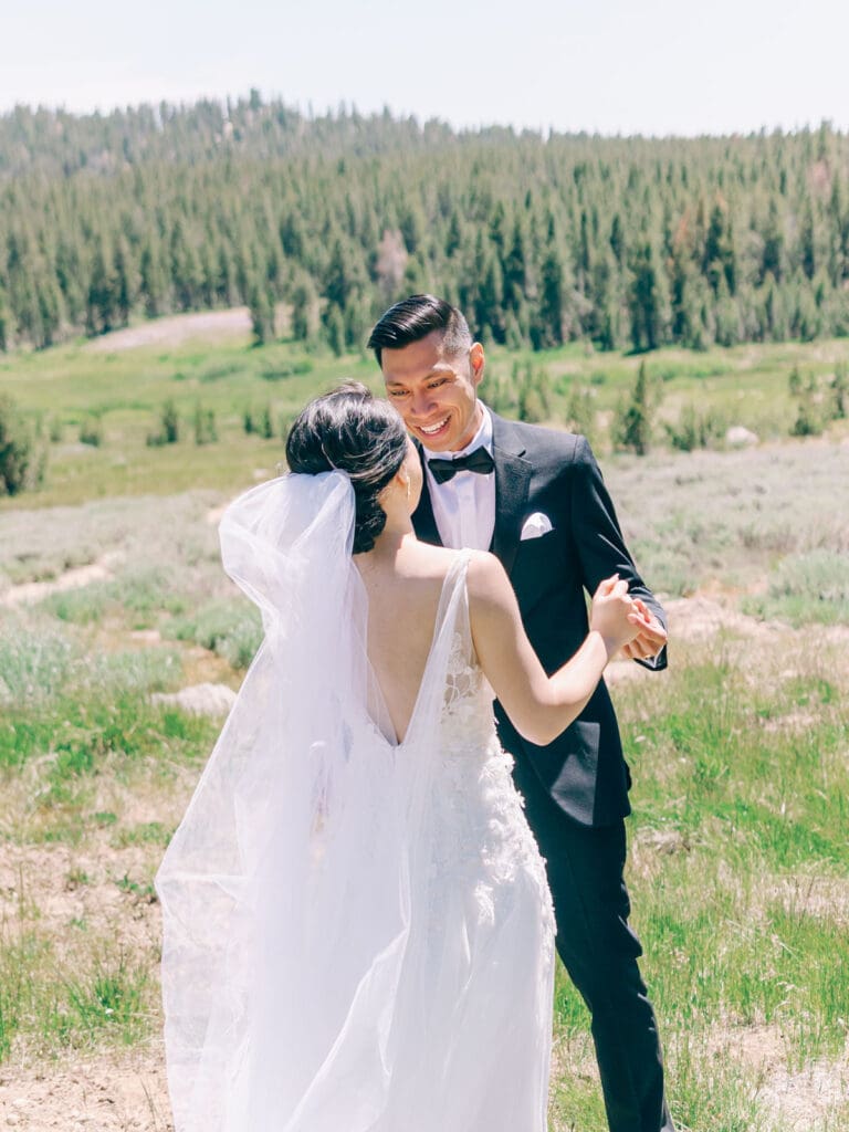 Bride and Groom First Look photo at Tannenbaum Lake Tahoe wedding venue, captured by the photographer.