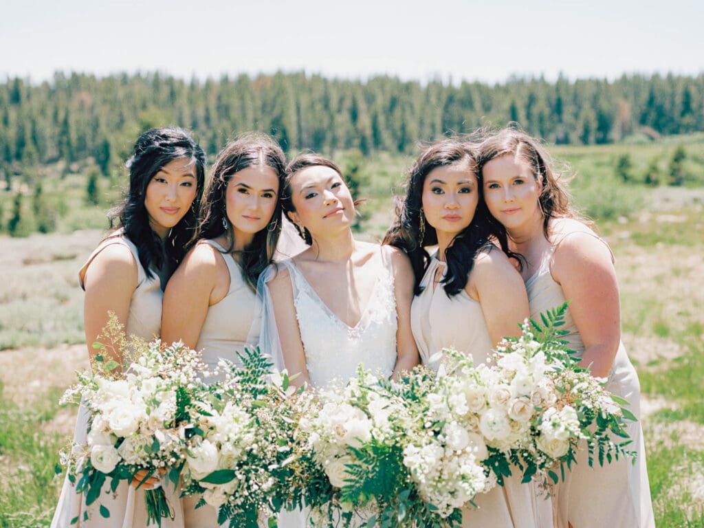 Bridesmaids at Tannenbaum Lake Tahoe wedding venue, captured by the photographer.