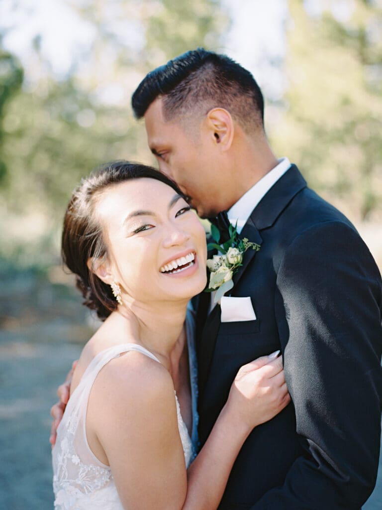 A bride and groom celebrate their wedding at Tannenbaum Lake Tahoe, beautifully photographed by a Tahoe wedding photographer.