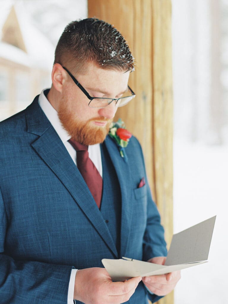 Groom portraits at Cozy Lake Tahoe Cabin Winter Wedding