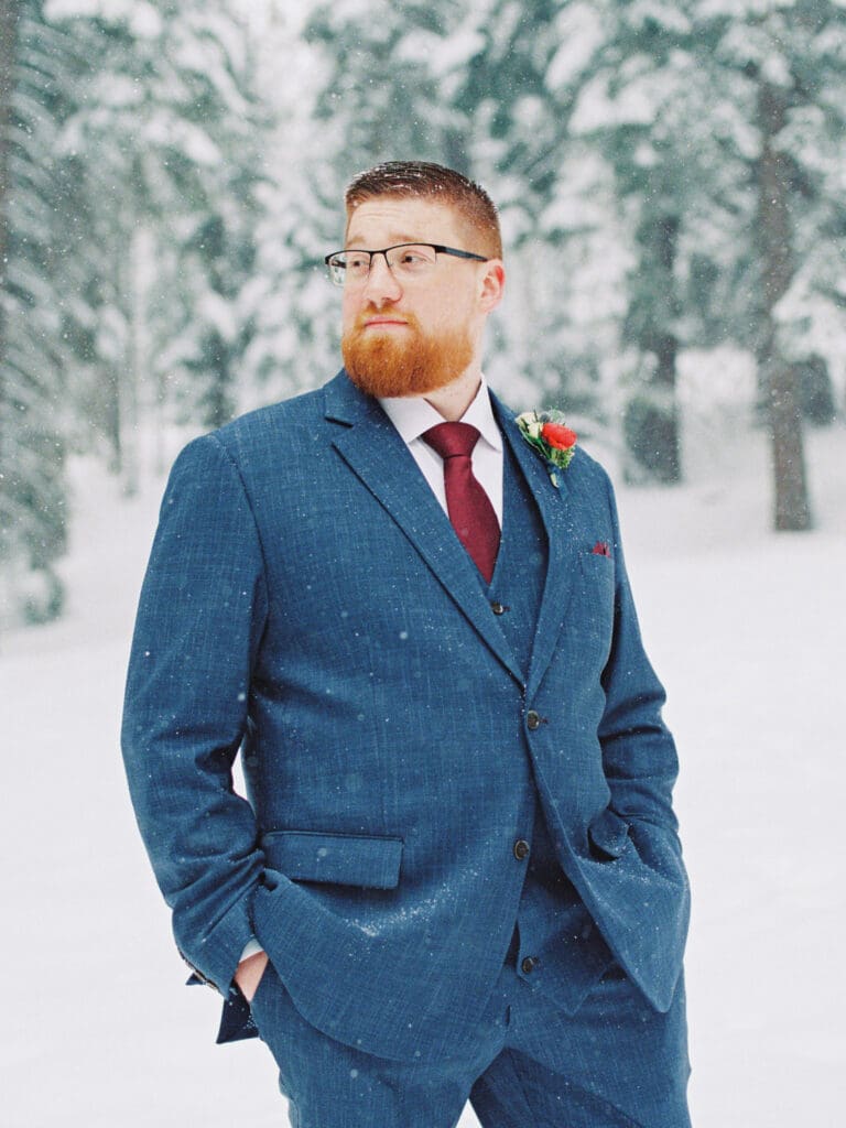 Groom portraits at Cozy Lake Tahoe Cabin Winter Wedding