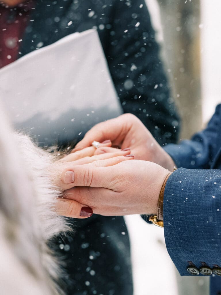 Marriage ceremony at Cozy Lake Tahoe Winter Wedding