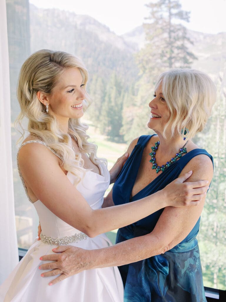 Bride and her mother pose together during getting ready portraits at Everline Resort, Lake Tahoe.