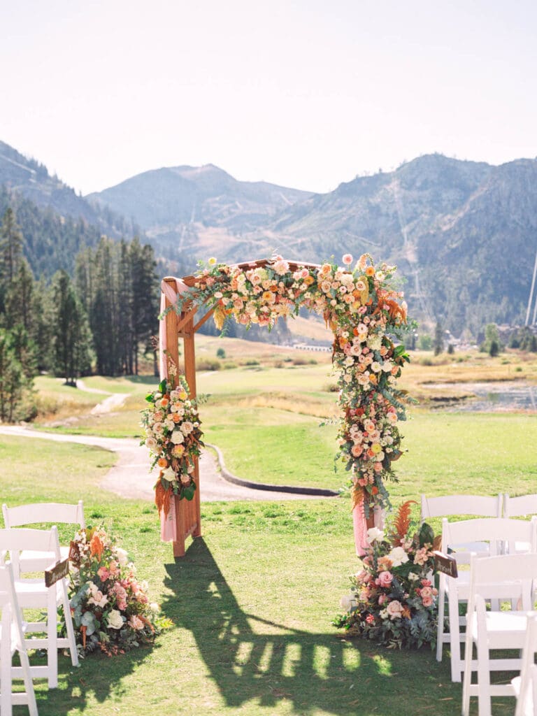 A picturesque wedding ceremony decor at Everline Resort, set against the stunning backdrop of Lake Tahoe's mountains.