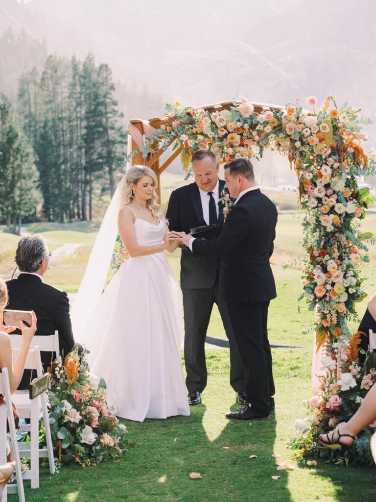 A breathtaking wedding ceremony at the summit of Everline Resort, surrounded by the stunning Lake Tahoe Mountains.