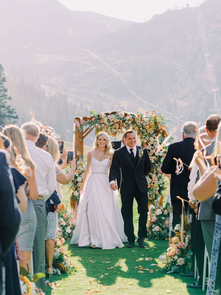 A breathtaking wedding ceremony at the summit of Everline Resort, surrounded by the stunning Lake Tahoe Mountains.