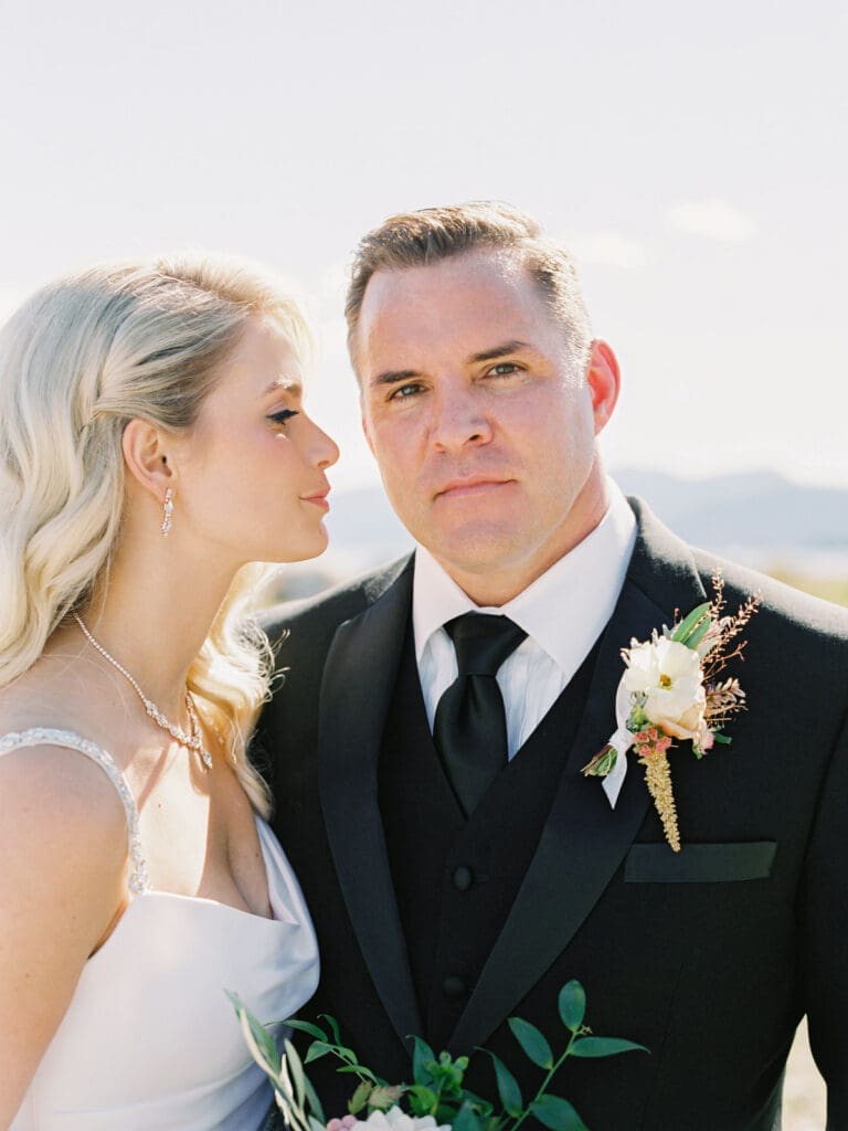 Bride and groom at Everline Resort wedding, showcasing the beautiful First Look with Lake Tahoe in the background.