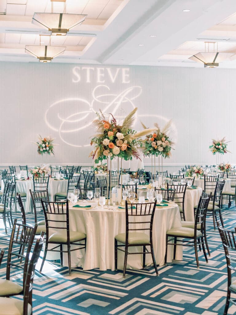 Elegant wedding reception at Everline Resort, Lake Tahoe, featuring, flowers, beautifully arranged tables and chairs for guests.